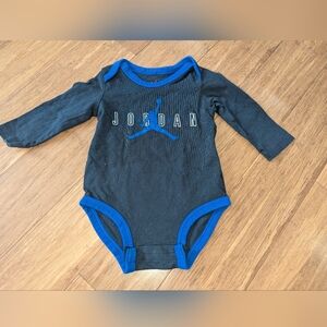 Jordan Black long sleeve baby bodysuit